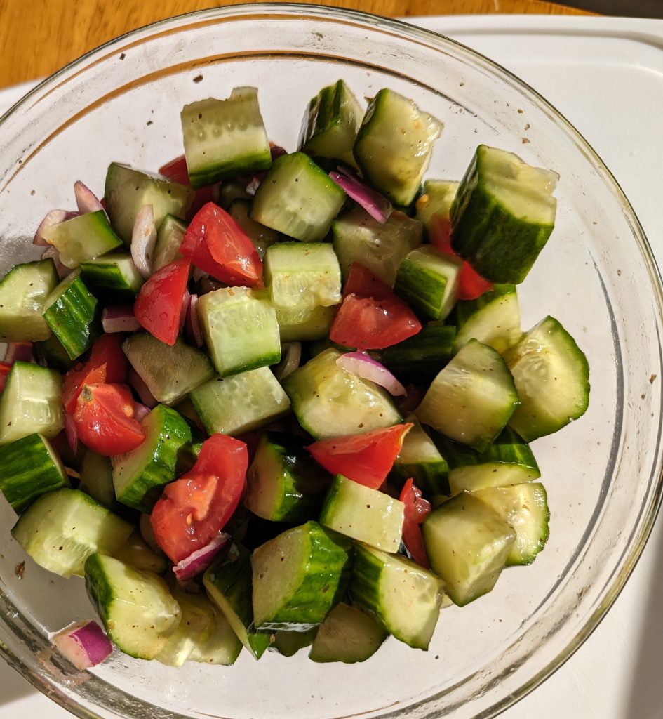 English Cucumber Salad mixed in bowl