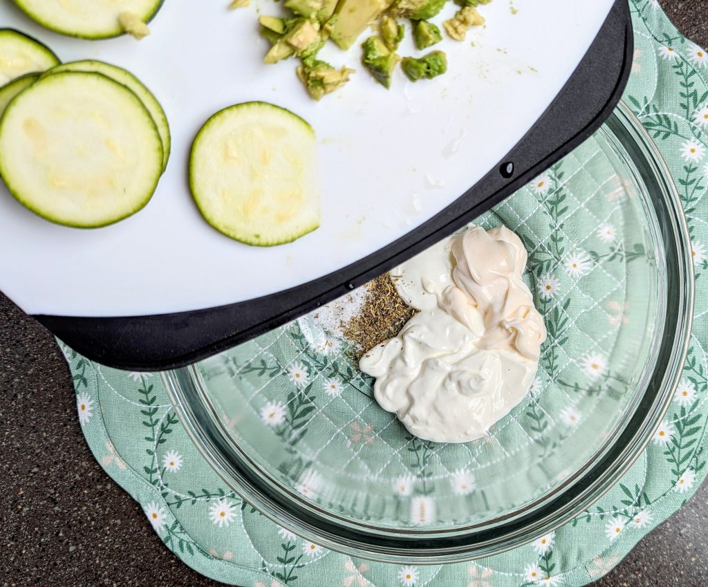 adding fruit to bowl