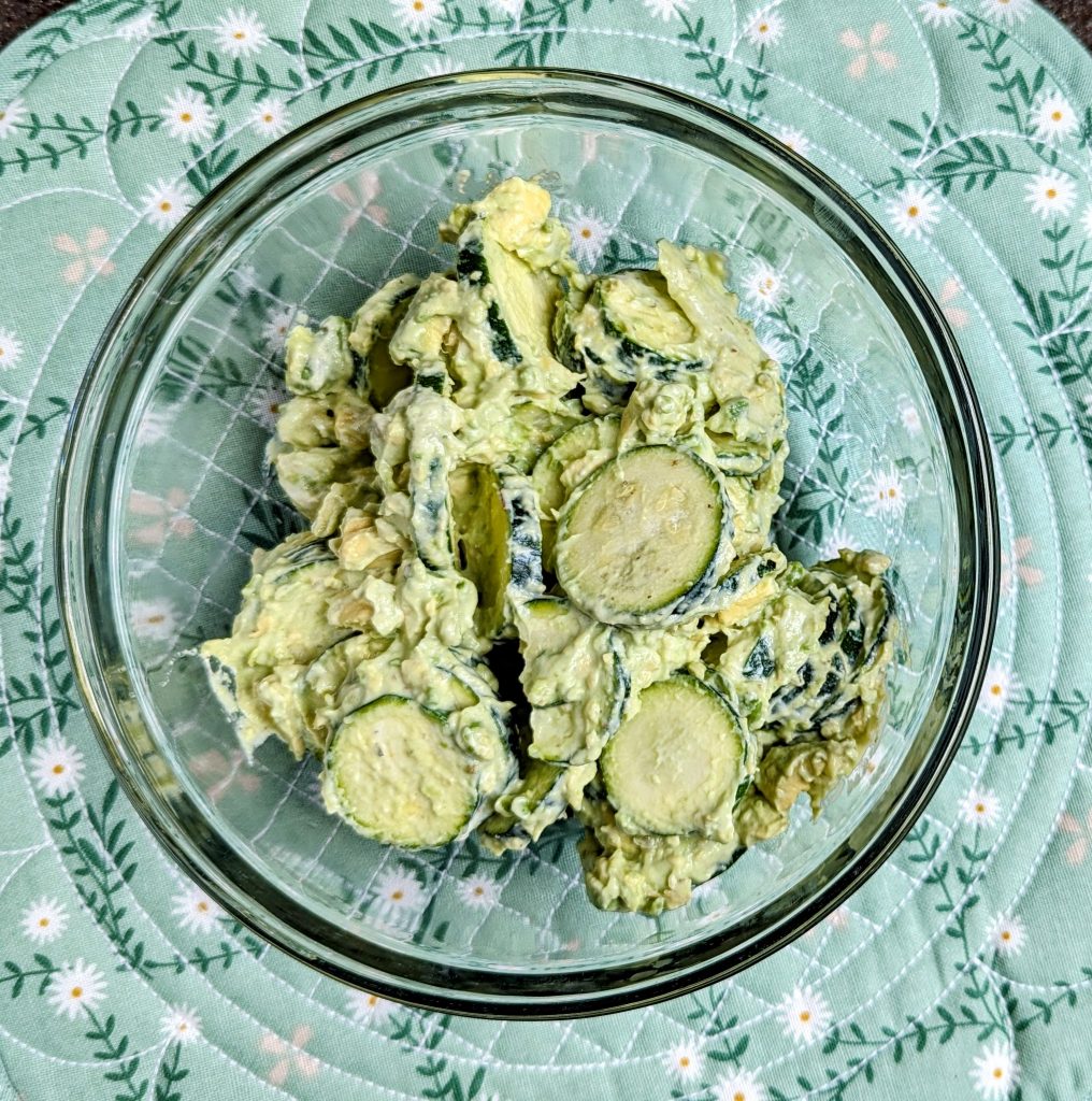 creamy avocado zucchini salad in bowl