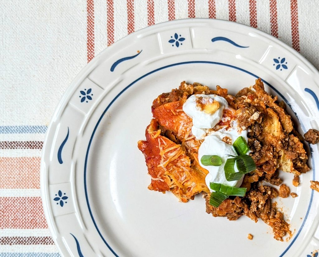 three layer cheesy taco bake on plate