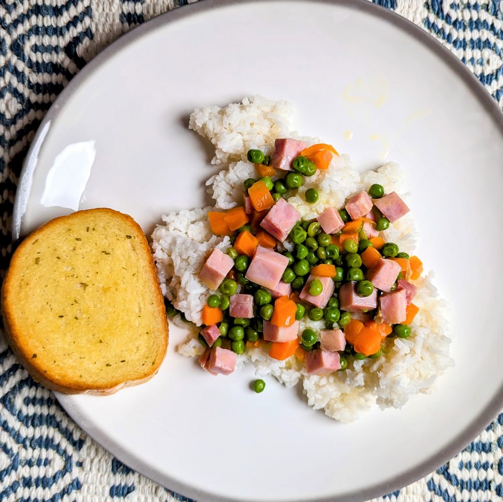 ham and vegetable dijon on plate with bread