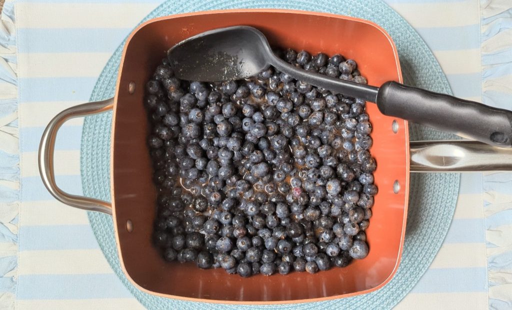 blueberries and syrup in pan