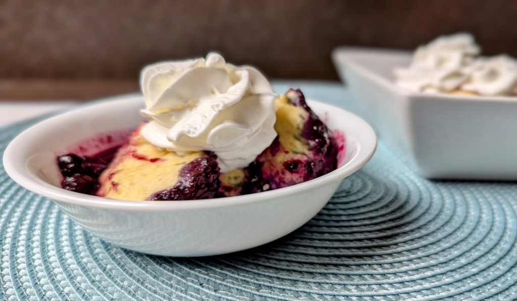 stovetop blueberry grunt in serving bowl