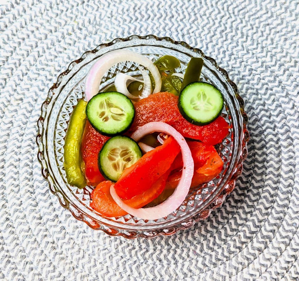 fire and ice tomato salad with cucumbers in bowl