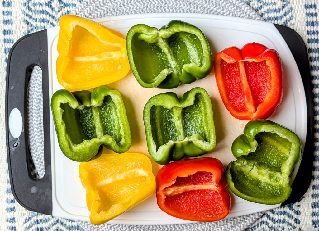 seeded peppers on cutting board