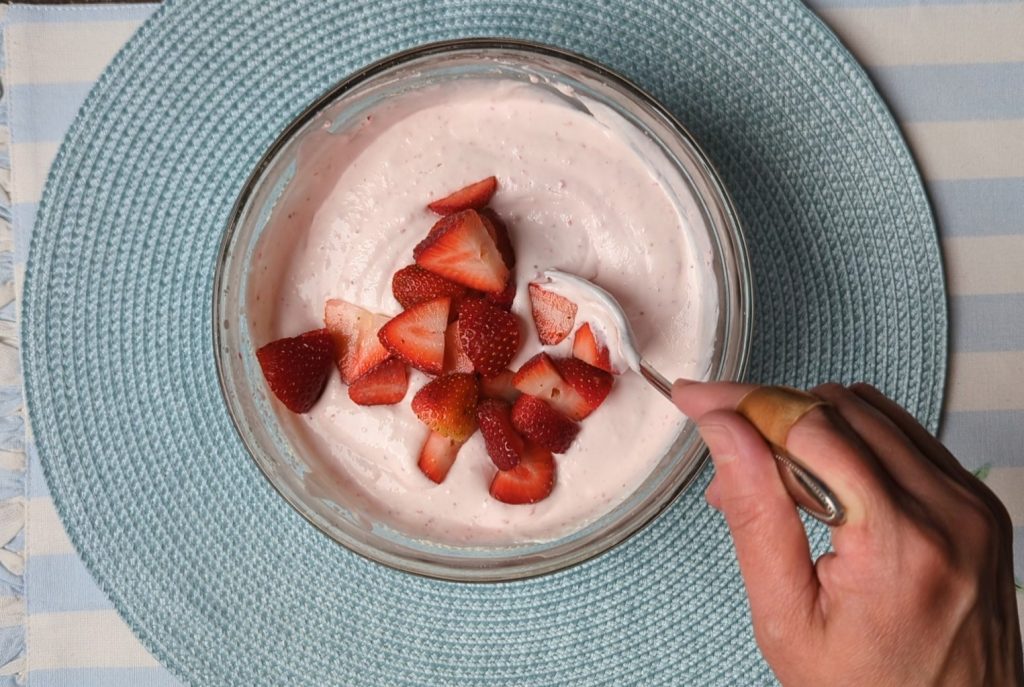 folding in strawberries