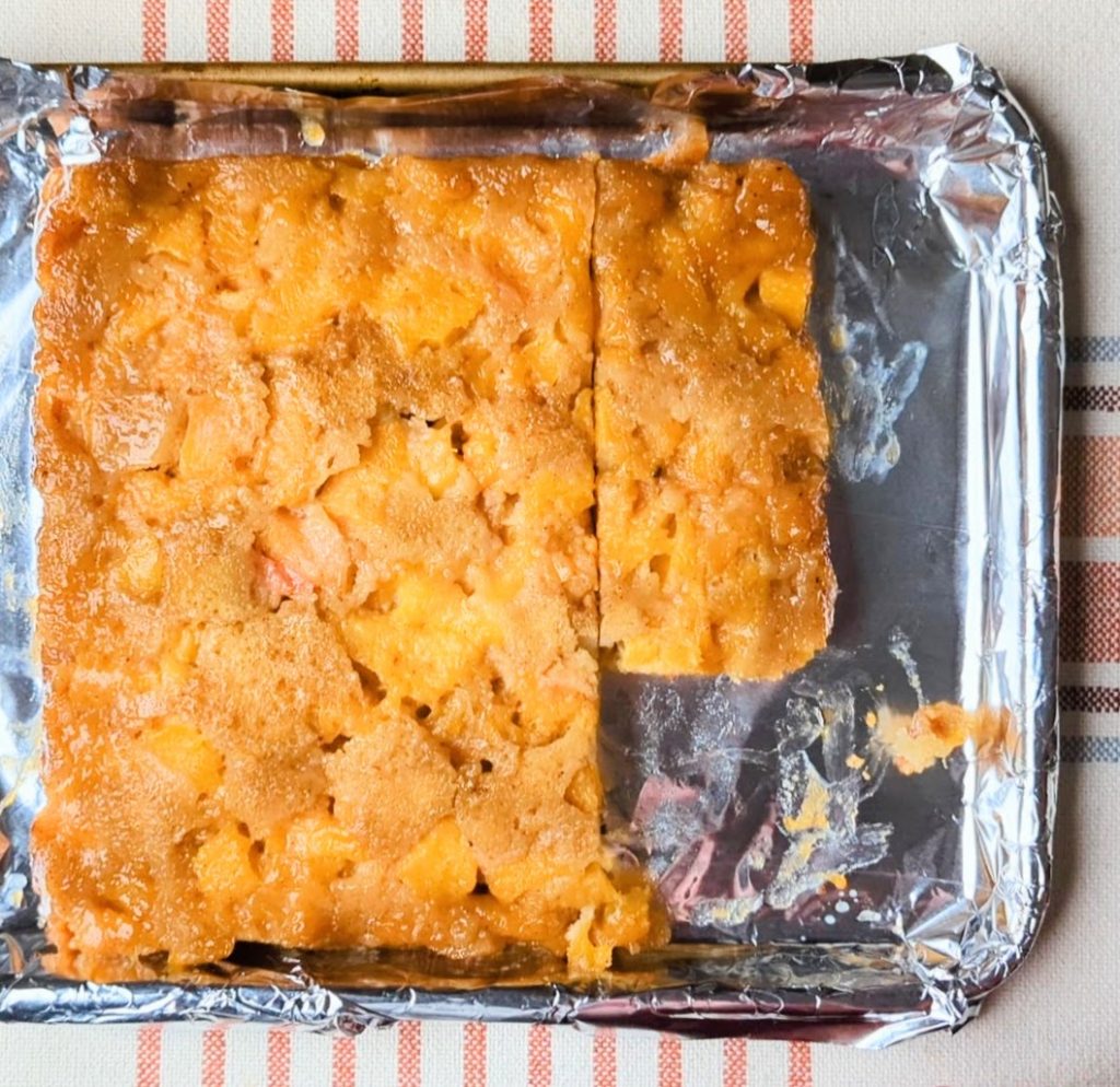 peach upside down cake in pan