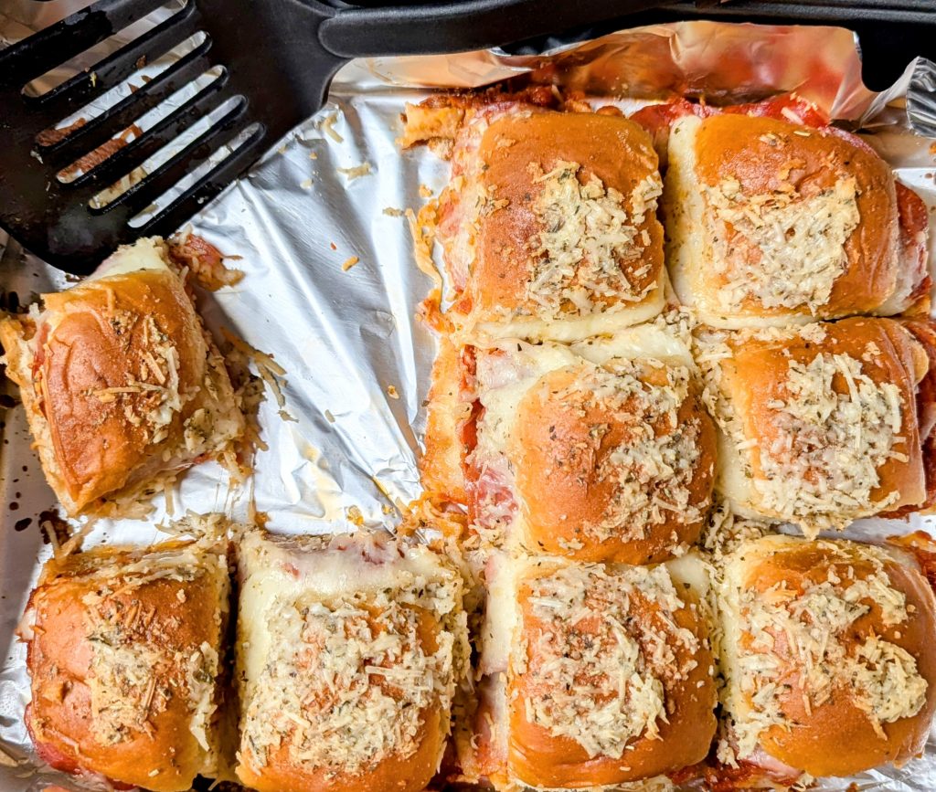 cheesy pepperoni pizza sliders in pan