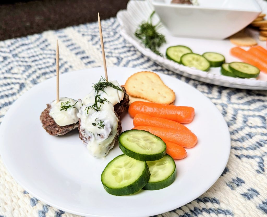 swedish meatballs with dill sauce appetizer on plate