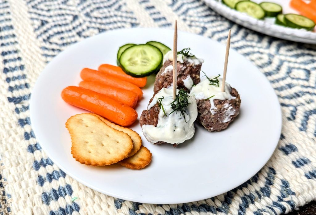 swedish meatballs with dill sauce appetizer on plate