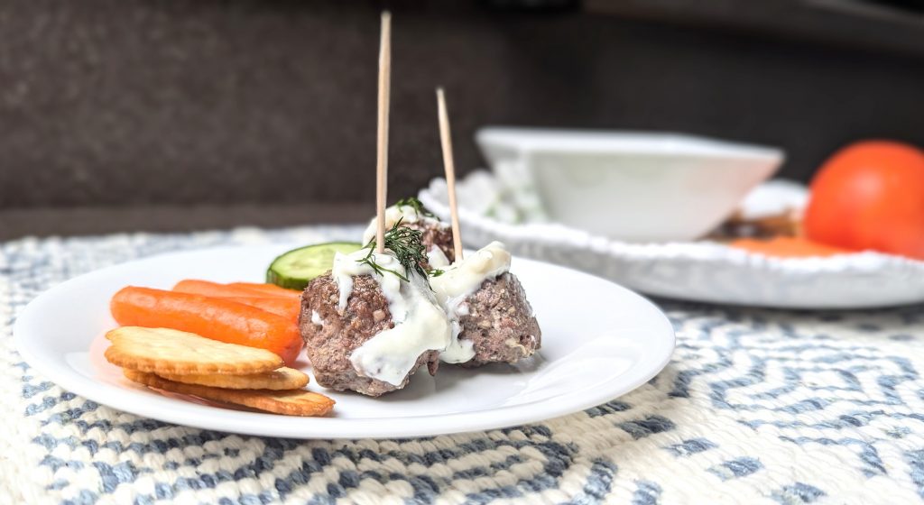 swedish meatballs with dill sauce appetizer on plate