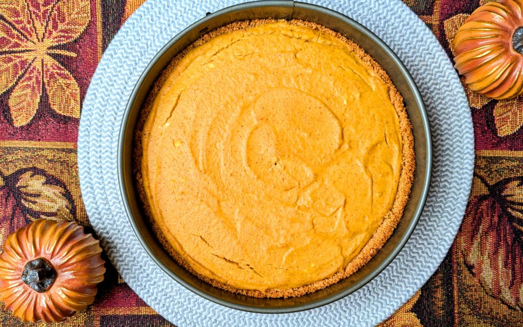 two layer pumpkin cheesecake in pan