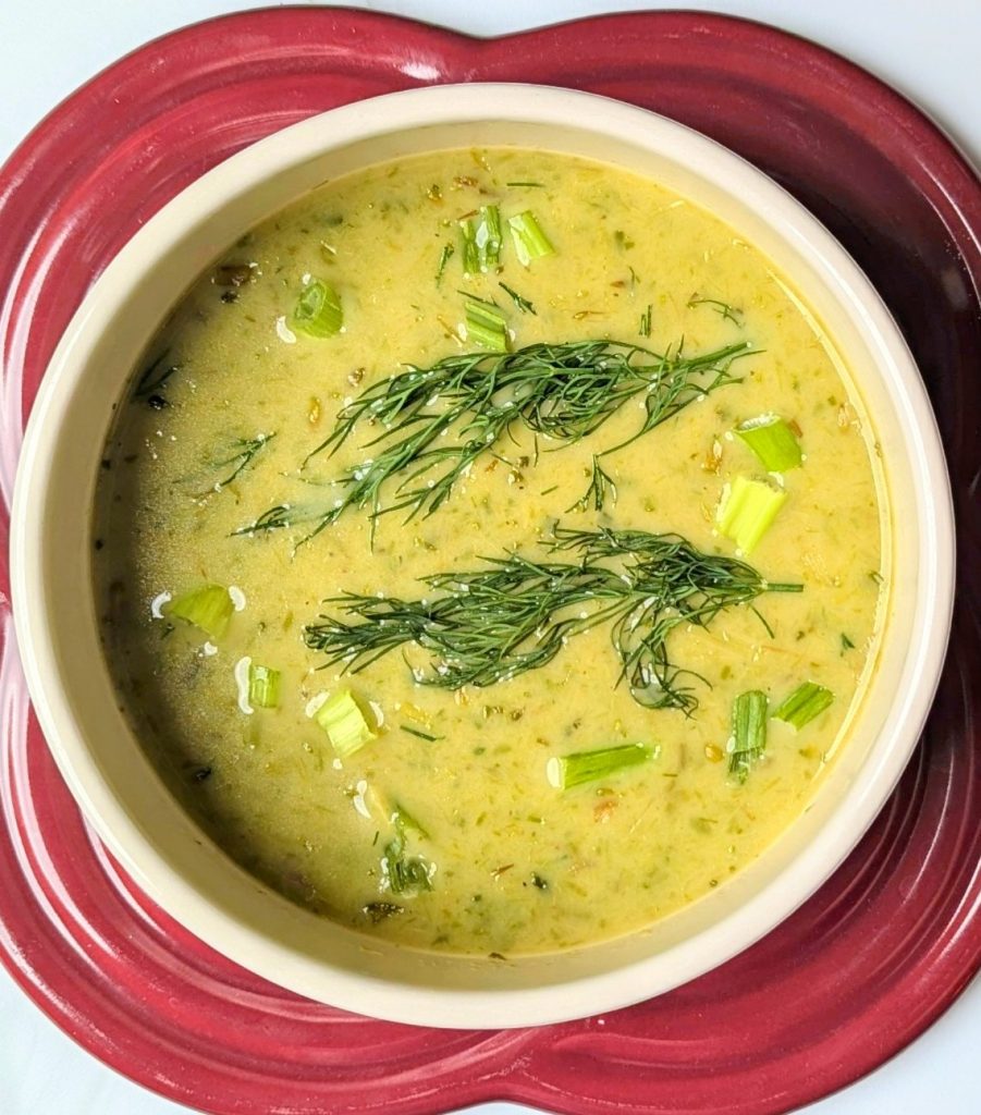 cream of roasted asparagus soup in bowl with garnish