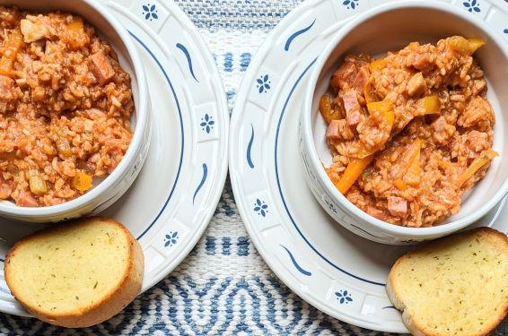 Ham and Chicken Jambalaya in bowls with bread