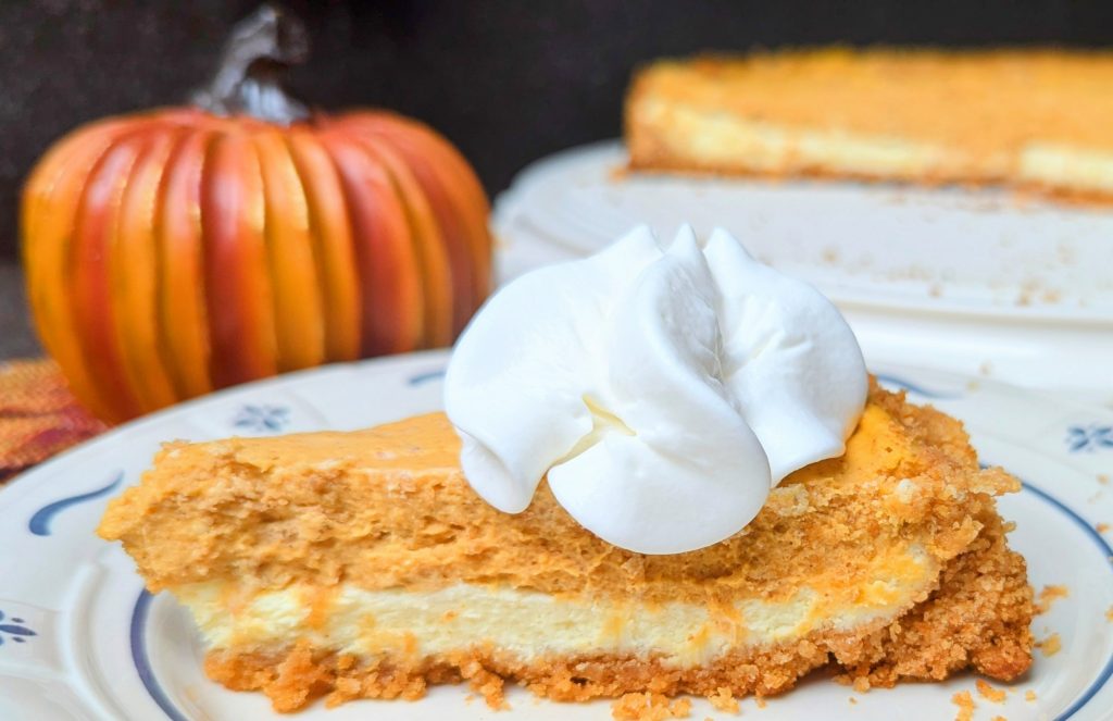 two layer pumpkin cheesecake  on plate