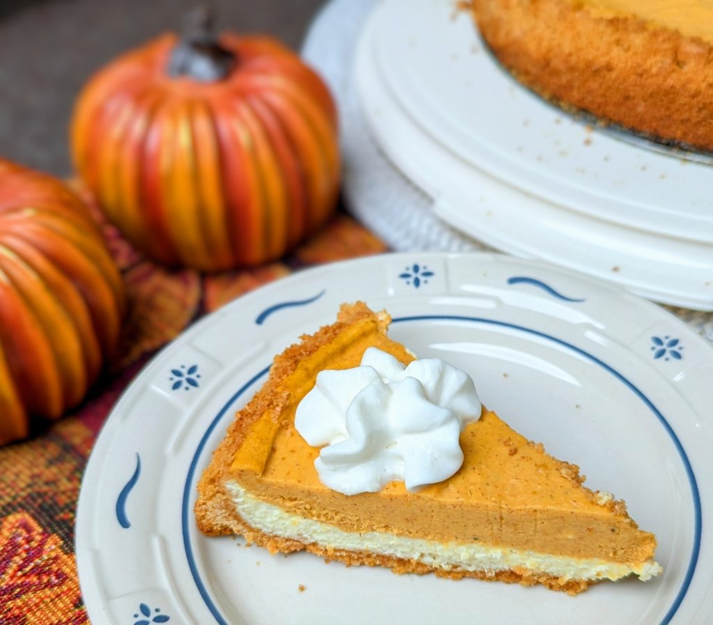 two layer pumpkin cheesecake on plate