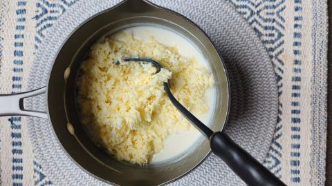 cheddar parmesan mac and cheese in saucepan