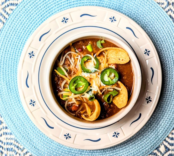 Easy Stove Top Chili in bowl with toppings