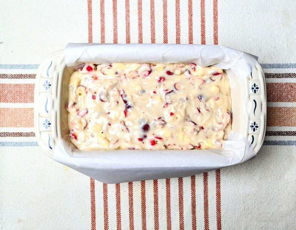 white chocolate cranberry bread in loaf pan