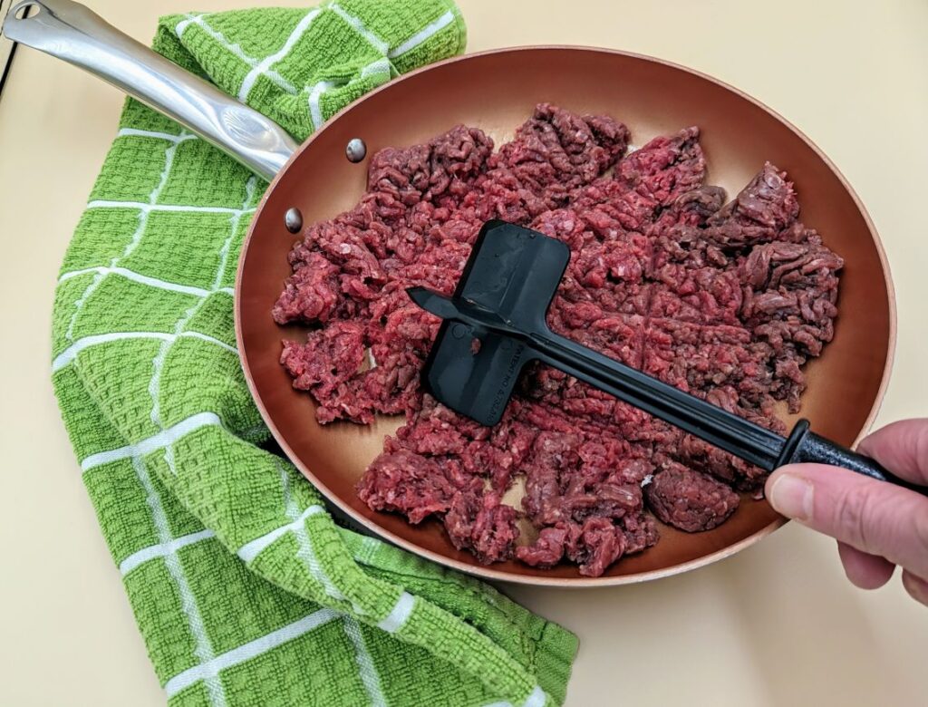 raw beef with meat chopper