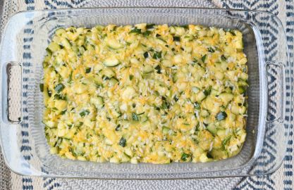 cheesy rice zucchini casserole in baking dish