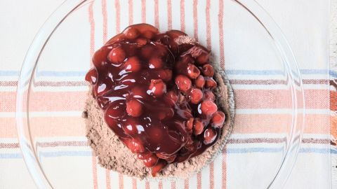 cherries and cake mix in bowl