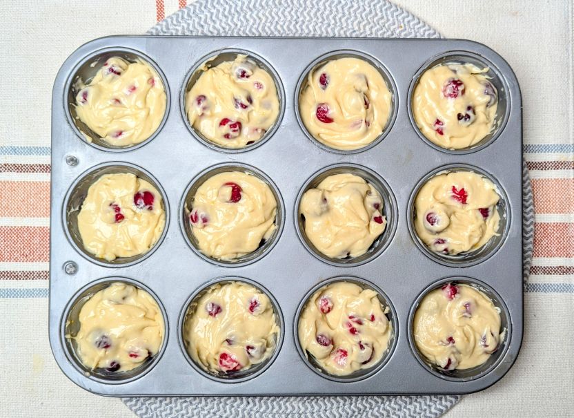 cranberry coffee cake muffins in pan