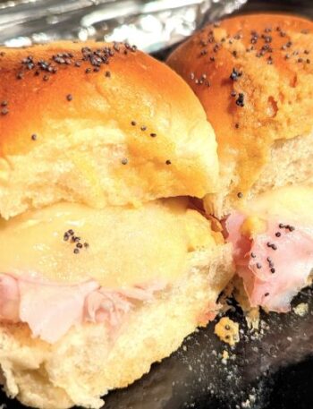 ham and swiss cheese sliders on pan