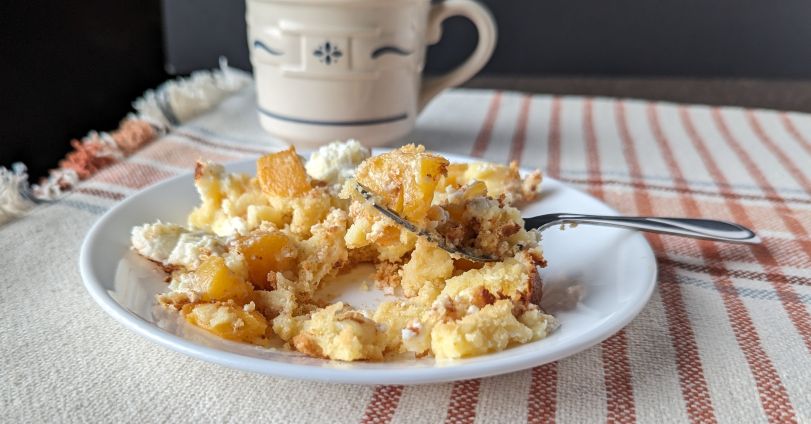 peaches and cream cake on plate