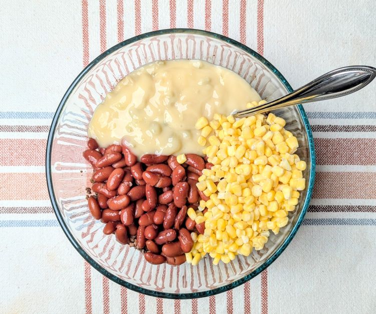 beans, corn and soup in bowl