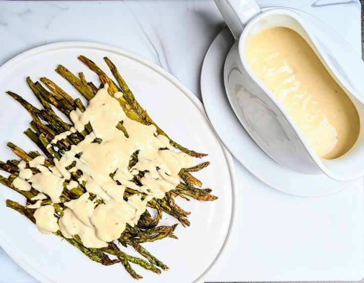 creamy dijon sauce on asparagus