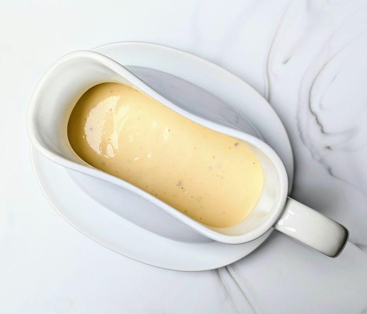 creamy dijon sauce in gravy boat