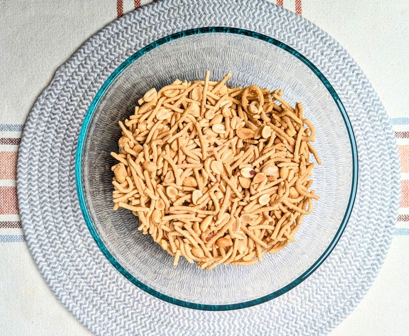 peanuts and chow mein noodles in bowl