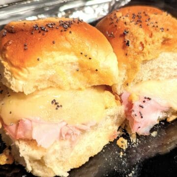 ham and swiss cheese sliders on pan