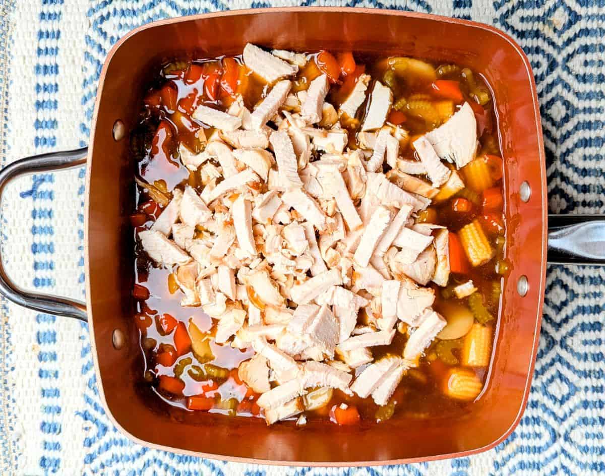 adding chicken