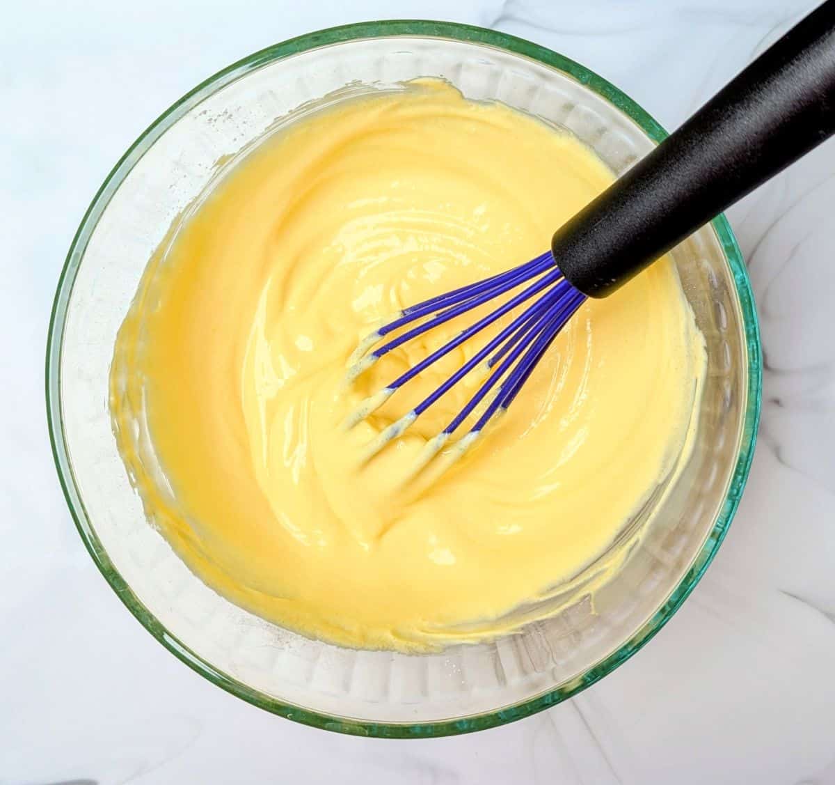 whisking the ingredients