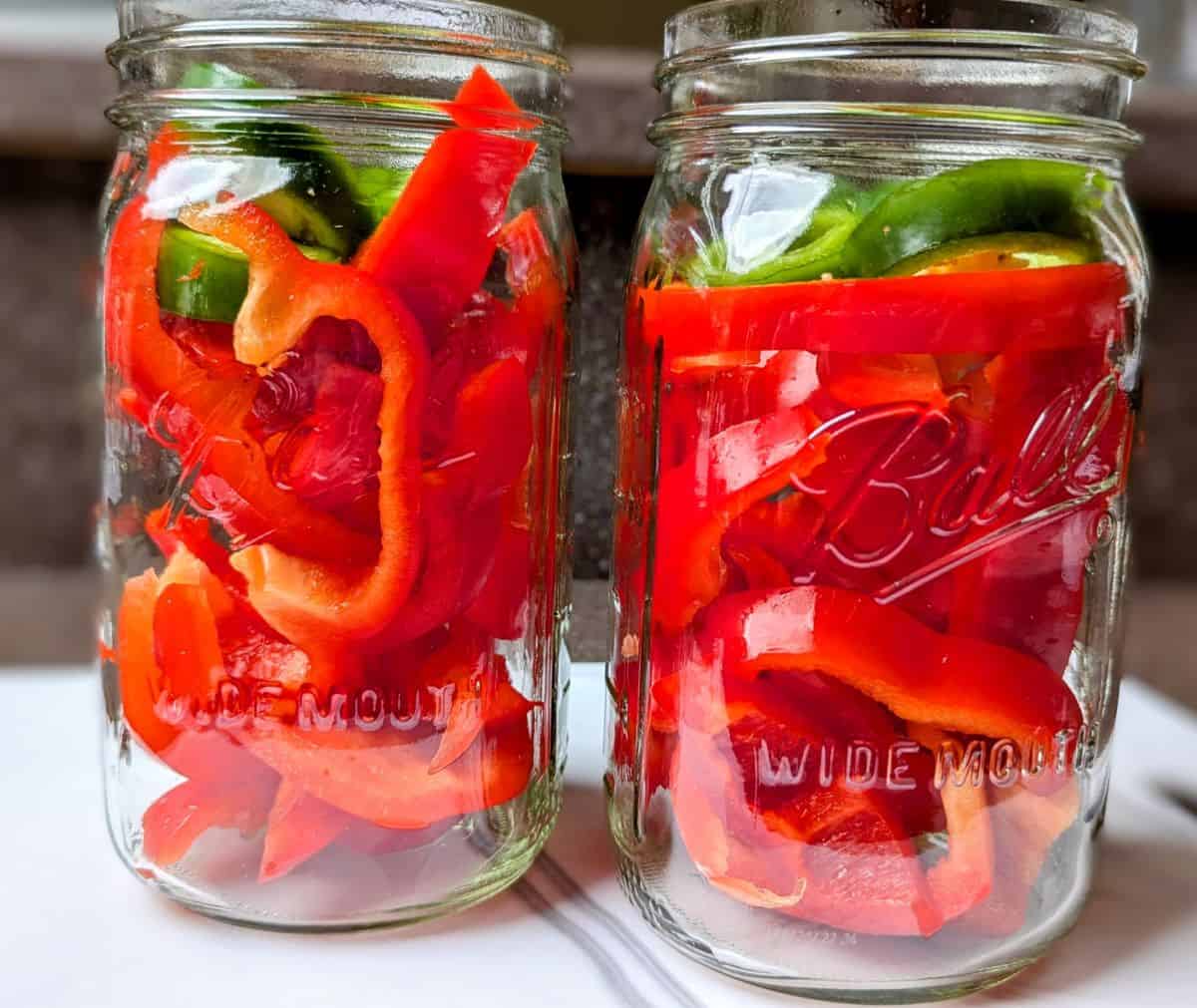 sliced peppers in jars