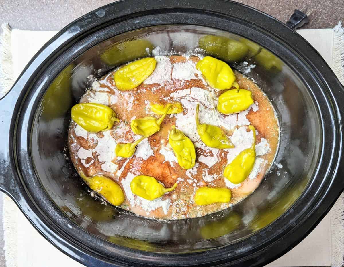 with peppers, seasoning, gravy and juice