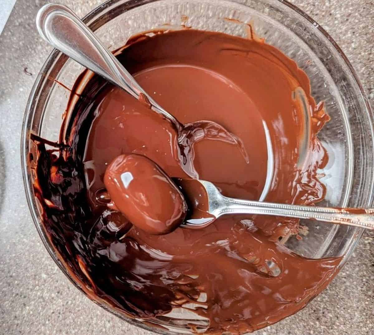 dipping football in chocolate