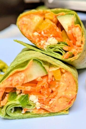 veggie hummus wraps on plates