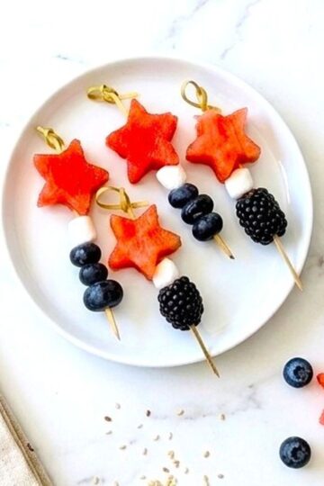 4th of july fruit kabobs on counter