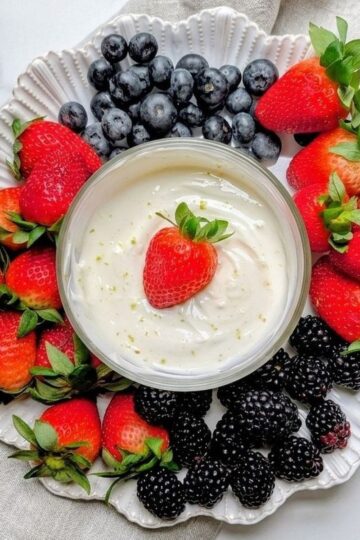 greek yogurt fruit dip recipe on fruit tray with berries for dipping