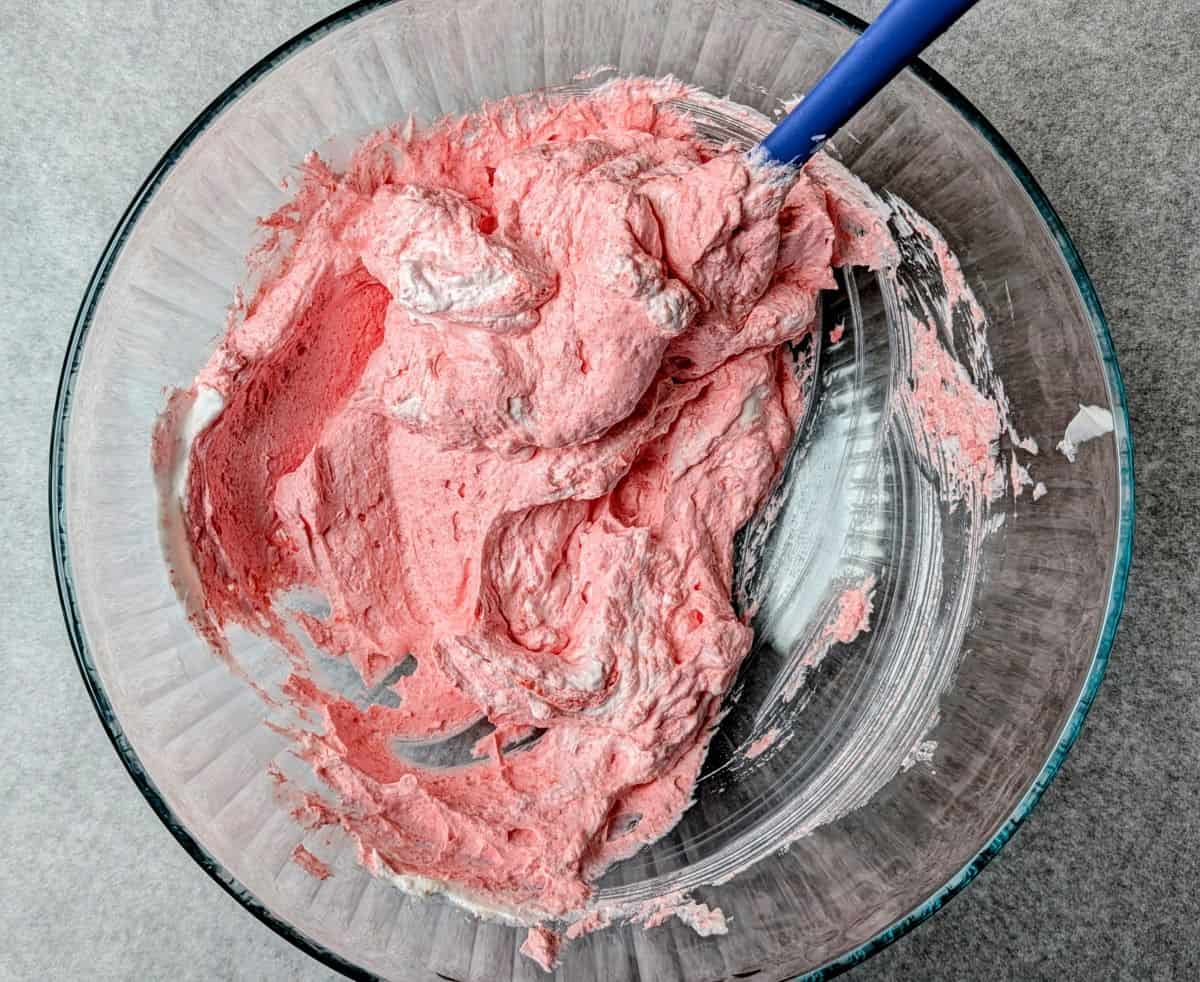 adding strawberry gelatin