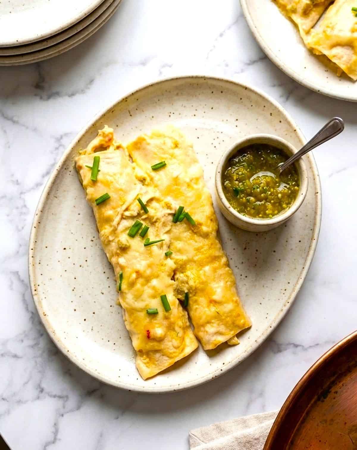 chicken enchiladas with green sauce in cup