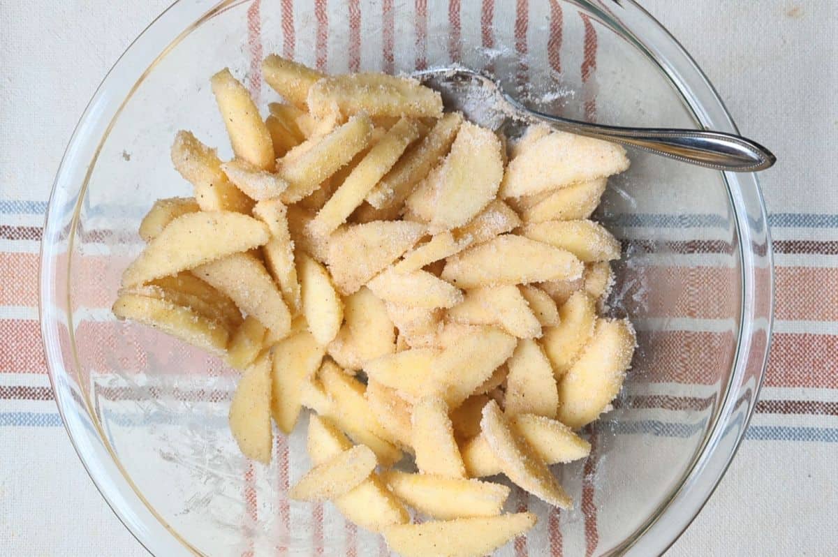 apples and spice mixture in bowl