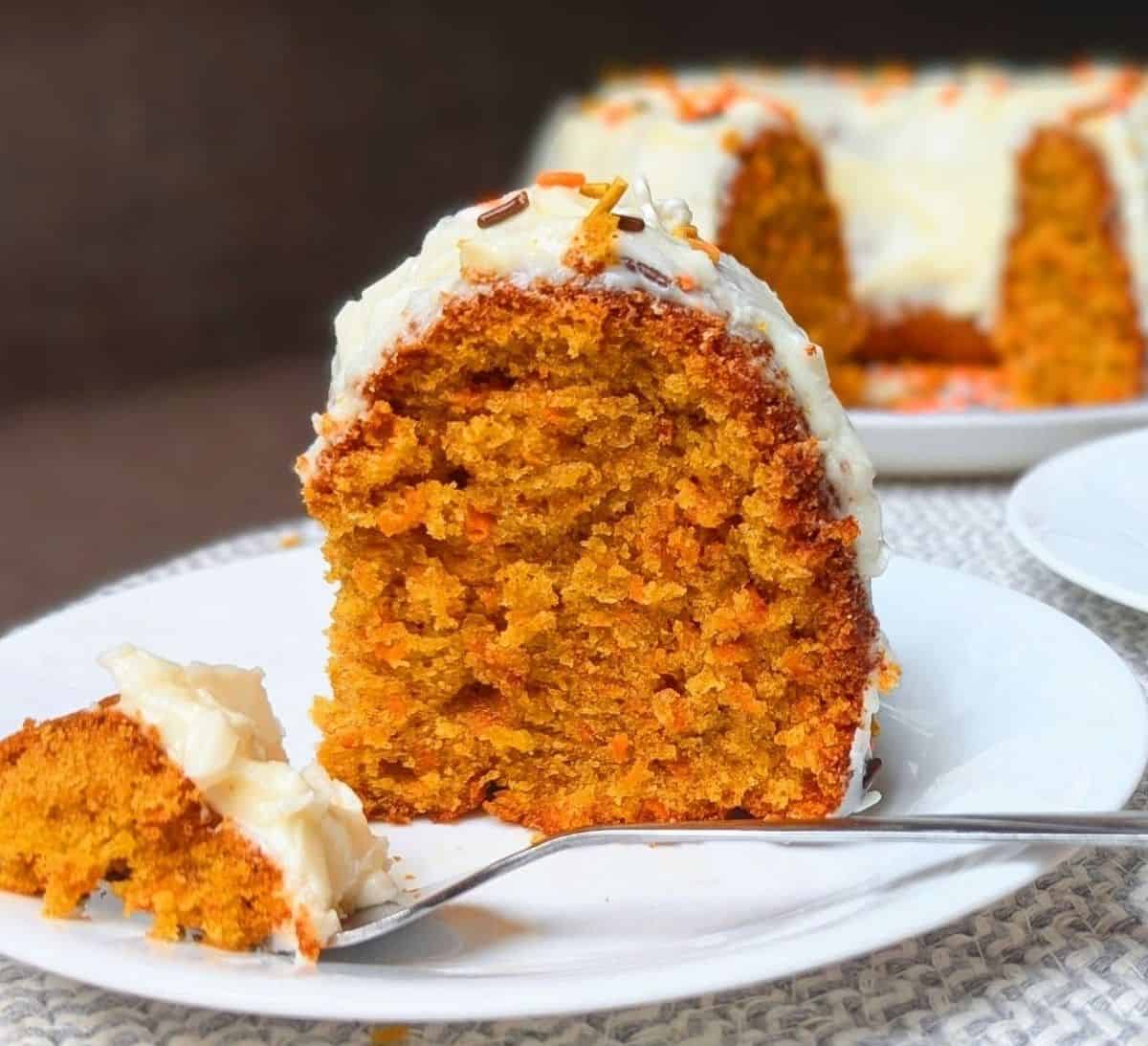 carrot bundt cake slice on plate with fork