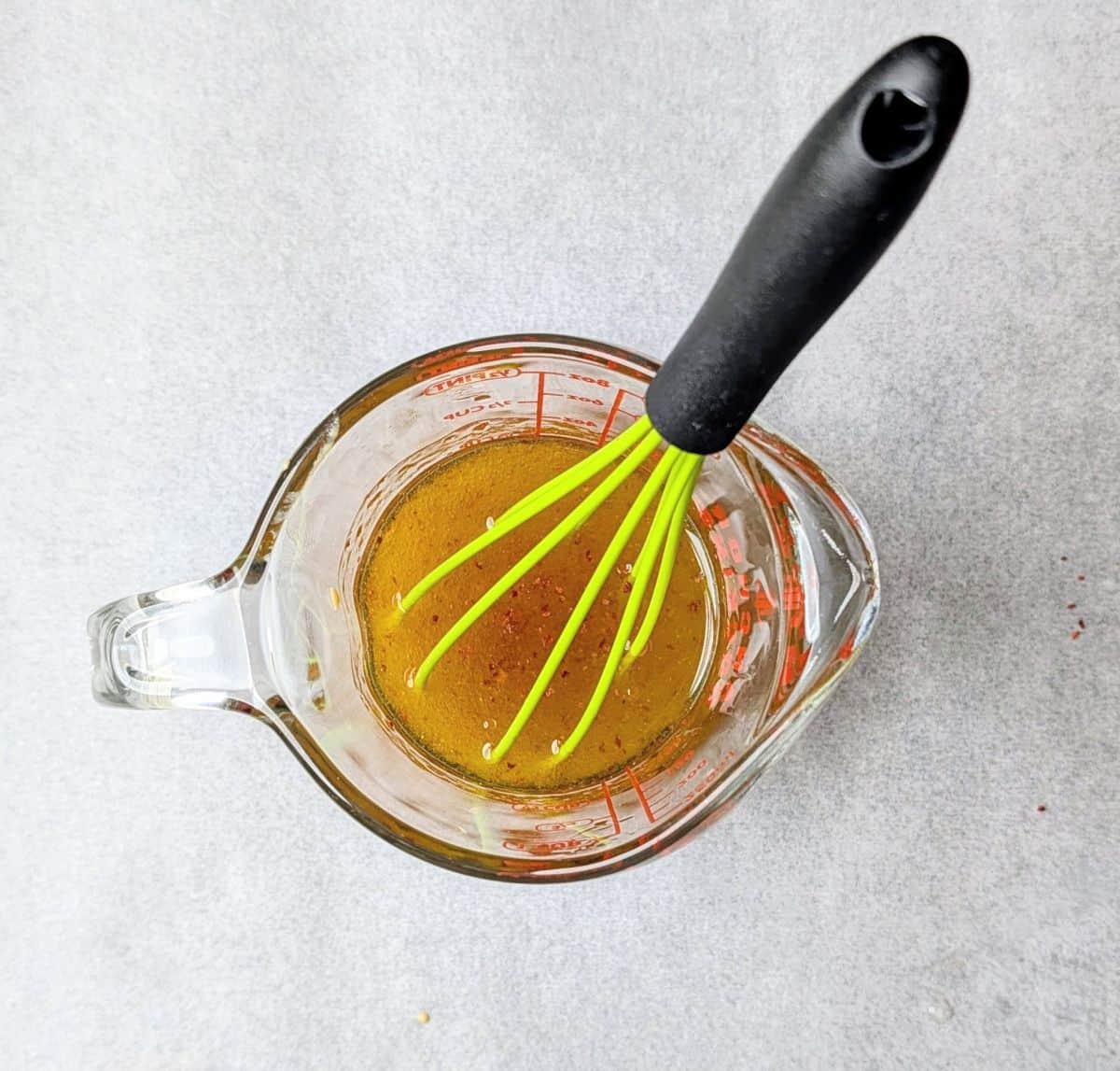 whisking the dressing