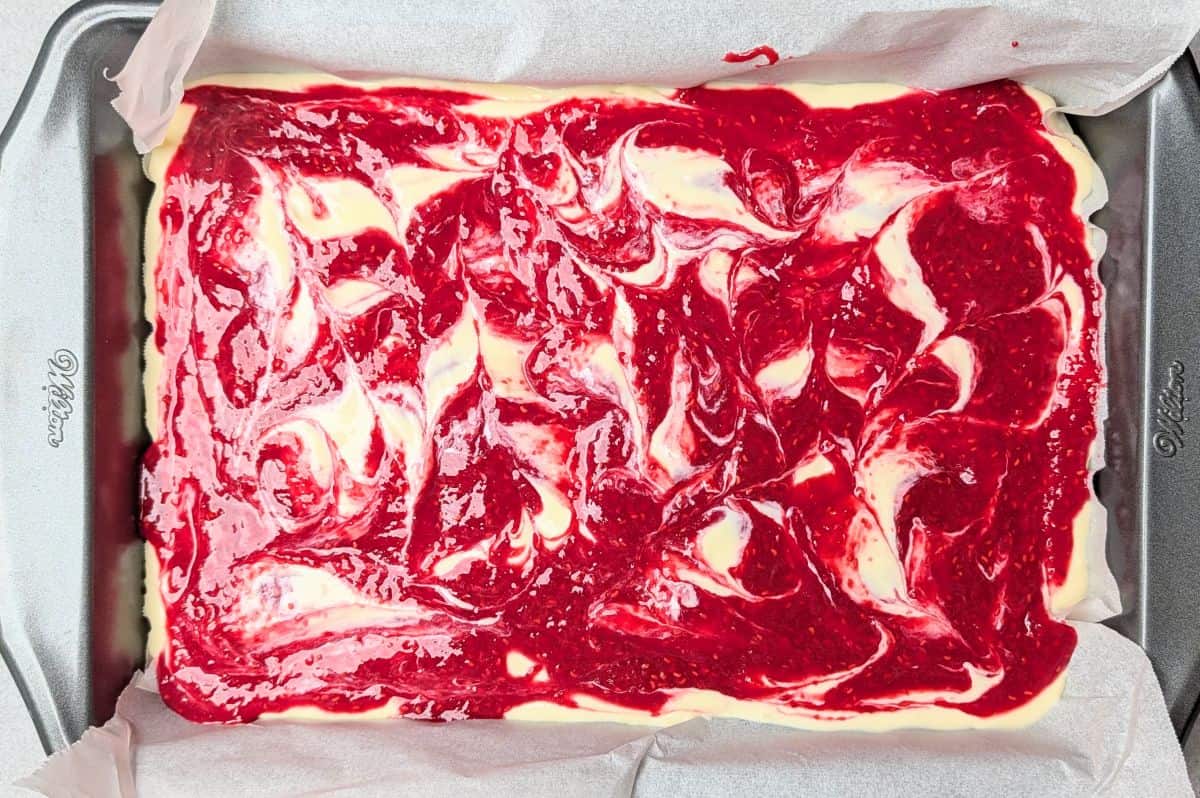 Creating a gorgeous swirled pattern in the unbaked filling.