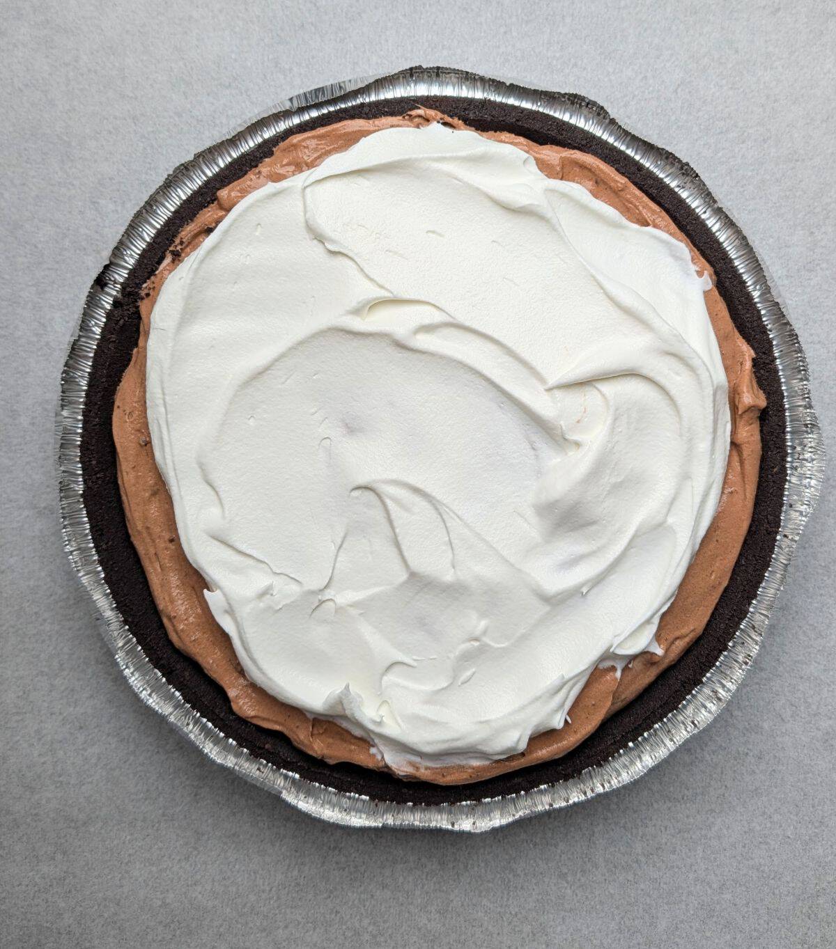 top layer of whip over chocolate pudding layer