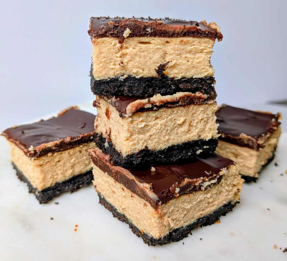 peanut butter bars stacked on plate